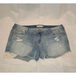Torrid light wash jean shorts with crochet detail